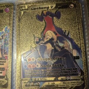 set of 3 Gold Pokémon Cards with Garchomp